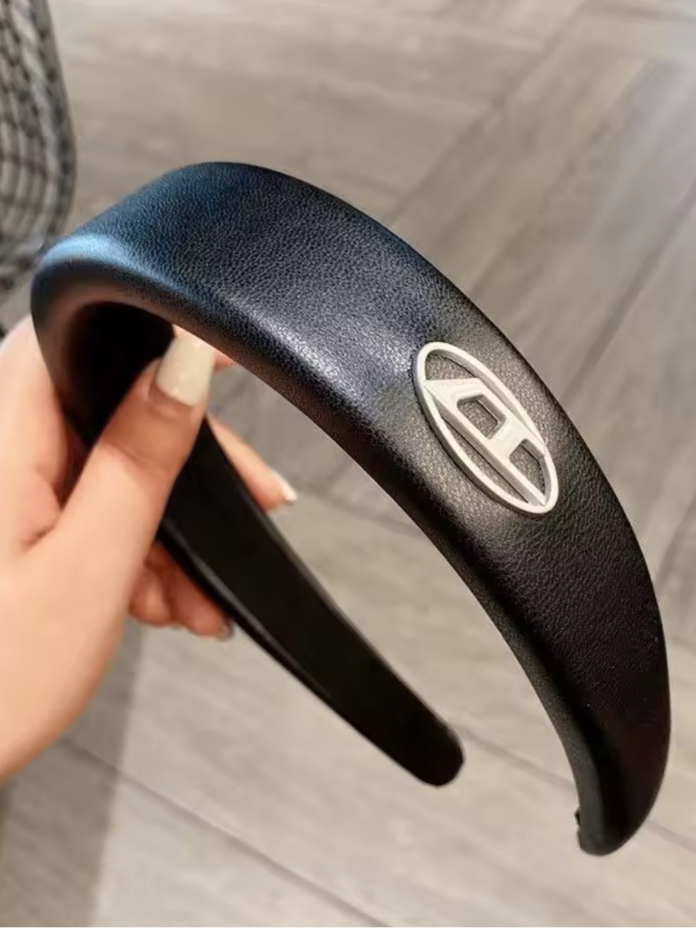 New designer inspired Black Leatherette Padded Headband with Silver Emblem